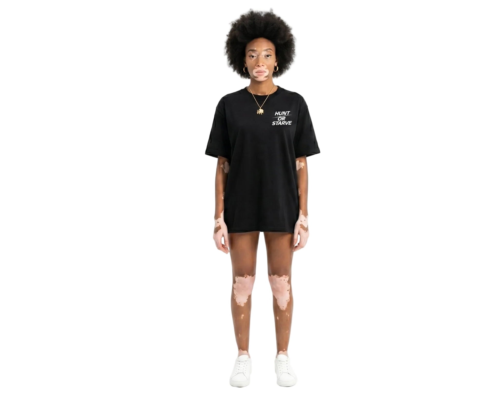 Person wearing a black t-shirt with text on a white background