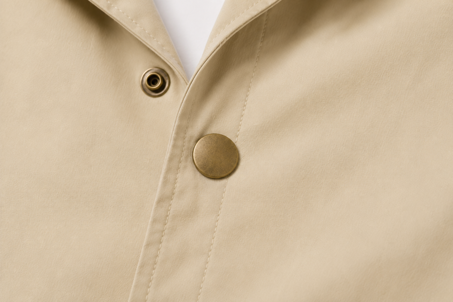 HUNT OR STARVE Coach Jacket detail — metal snap-button front closure